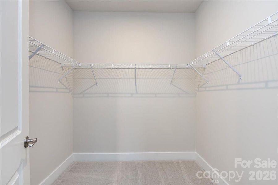 Primary walk-in closet