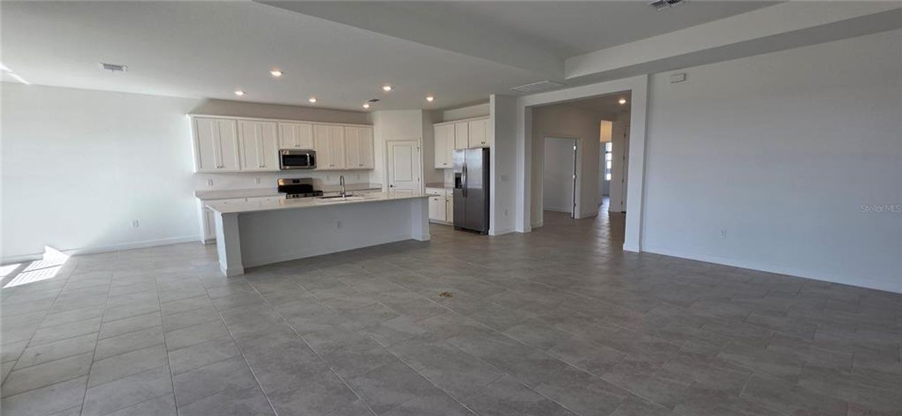 Spacious, unfurnished interior of a new home in Rye Ranch: Manor Homes, Parrish (Image 16).