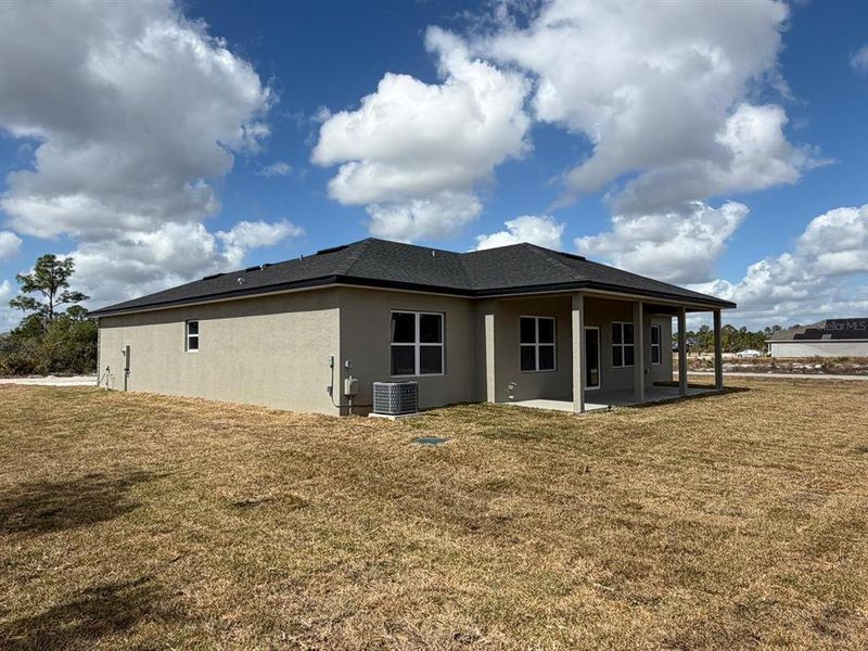 Exterior details and patio area of a home in , Sebring (Image 3).