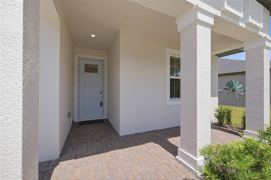 Exterior details and patio area of a home in Angeline Active Adult, Land O' Lakes (Image 3).