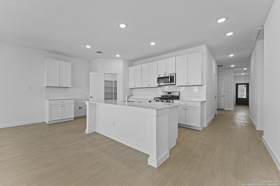 Furnished interior view inside a new home in Waterwheel, San Antonio (Image 4).