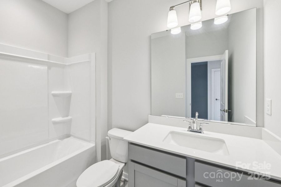 Furnished interior view inside a new home in Walk23, Huntersville (Image 5).