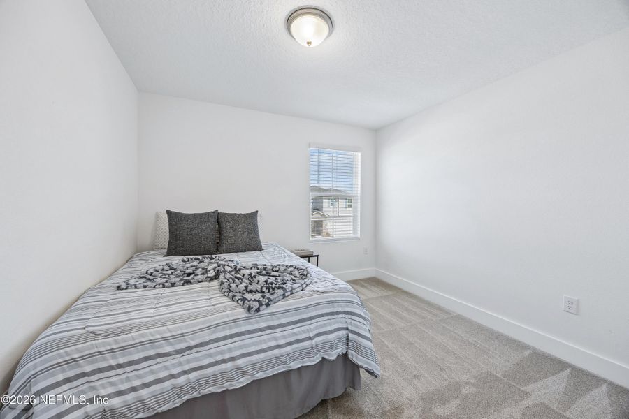 Furnished interior view inside a new home in Cordova Palms, St. Augustine (Image 11).
