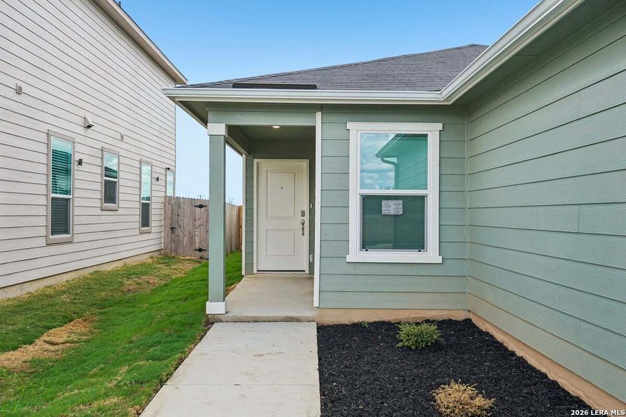 Exterior details and patio area of a home in Southton Cove, Elmendorf (Image 16).