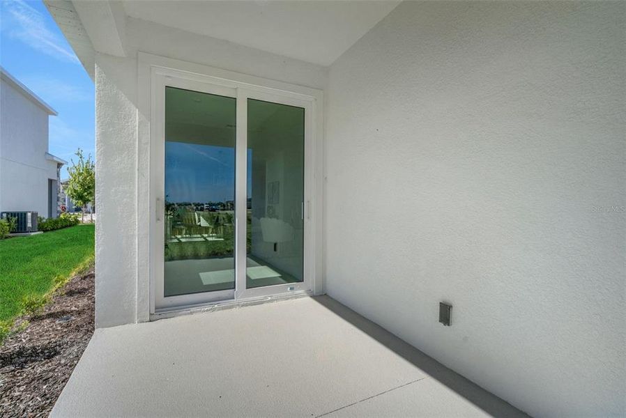 Exterior details and patio area of a home in Creekside Run at Babcock Ranch, Punta Gorda (Image 22).