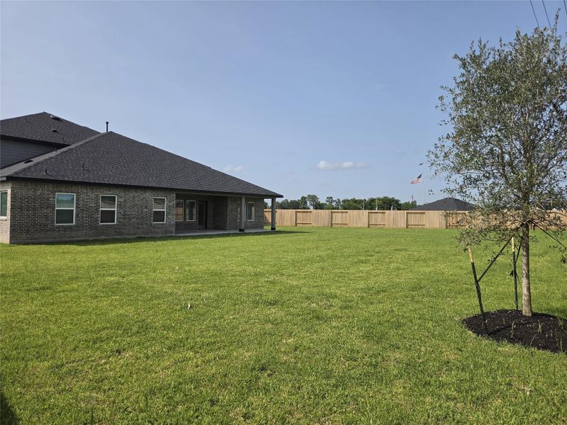Exterior details and patio area of a home in Riverside Estates, Baytown (Image 3).