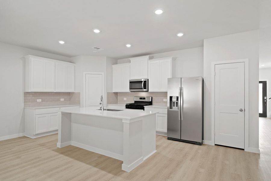 Furnished interior view inside a new home in Lakes at Black Oak, Magnolia (Image 10).