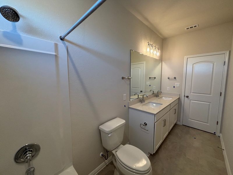 Furnished interior view inside a new home in Cannon Ranch 40s, Dripping Springs (Image 12).