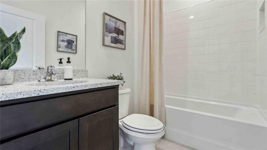 Furnished interior view inside a new home in Twisted Oaks, Wildwood (Image 7).