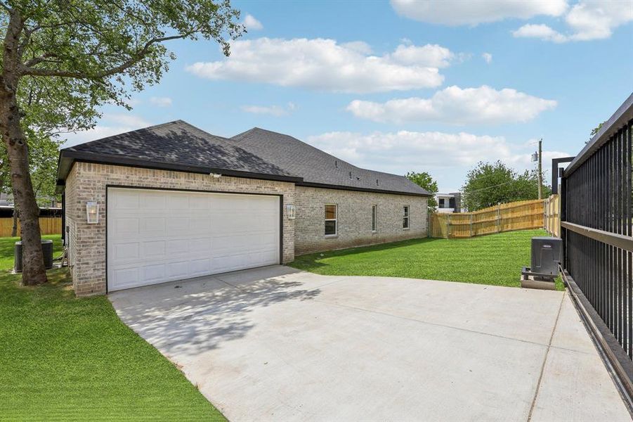 Front exterior of a new home in , Dallas, TX, highlighting curb appeal (Image 14).