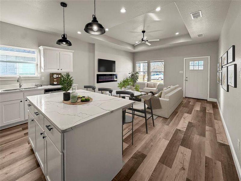 Kitchen & Living shown furnished for inspiration.