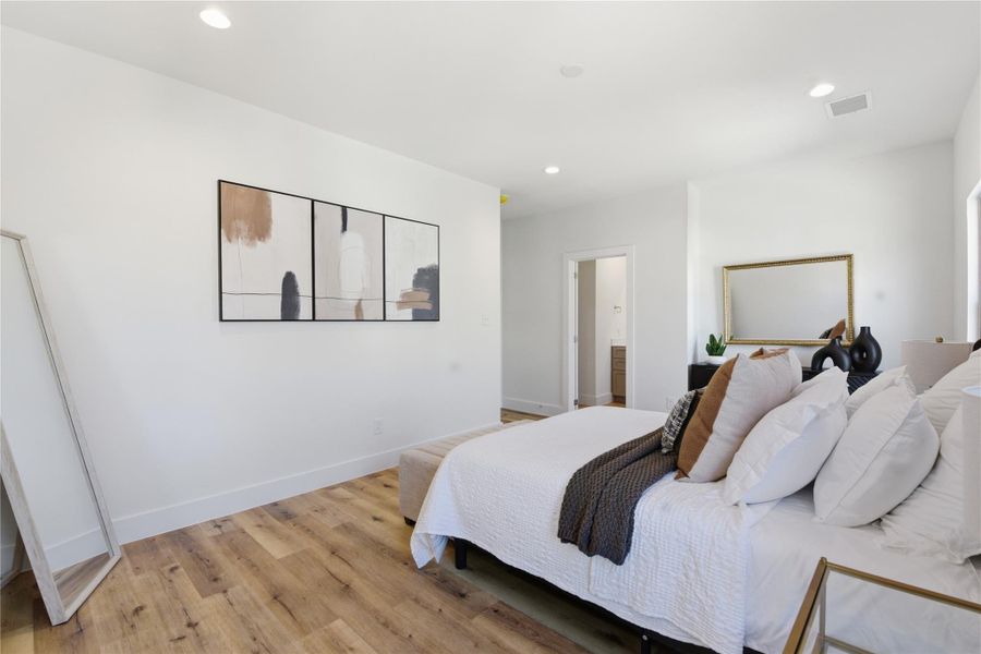 Bright and spacious bedroom with modern decor.