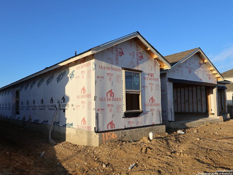 In-progress construction of a new home in Greenspoint Heights, Seguin, TX (Image 25).