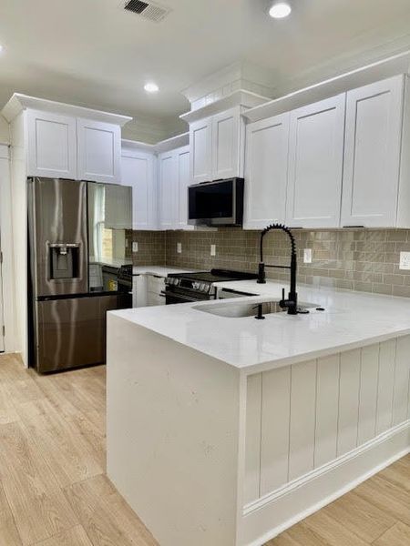 Furnished interior view inside a new home in , North Charleston (Image 11).