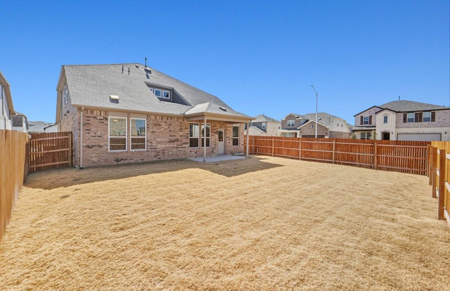 Exterior details and patio area of a home in Lagos, Manor (Image 27).