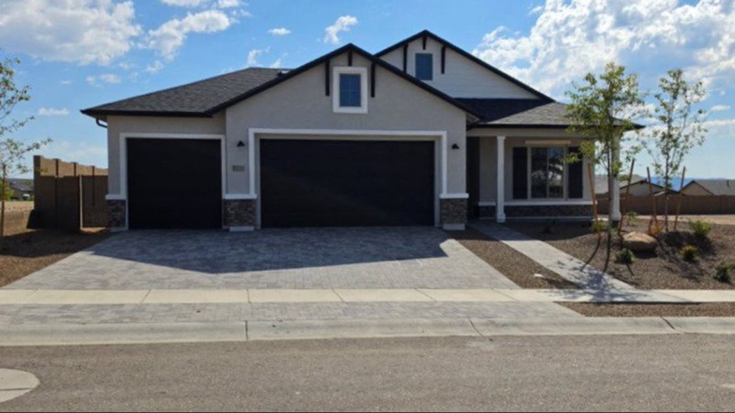 Front exterior of a new home in Horizon at The Dells, Prescott, AZ, highlighting curb appeal (Image 1). Front exterior of a new home in Horizon at The Dells, Prescott, AZ, highlighting curb appeal (Image 1).