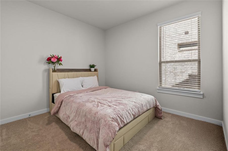 Furnished interior view inside a new home in LakePointe, Lavon (Image 16).