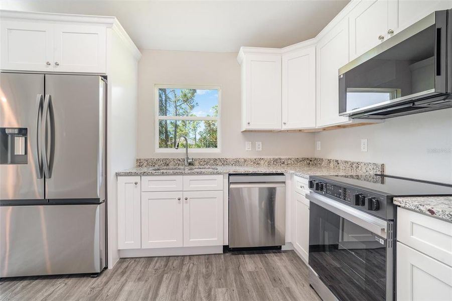Furnished interior view inside a new home in , North Port (Image 7).