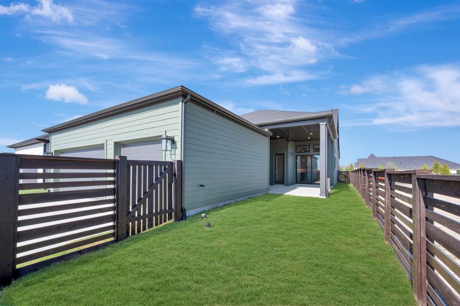 Exterior details and patio area of a home in Bridgeland Central: Emerald Heights - Enclave Row Collection, Cypress (Image 3).