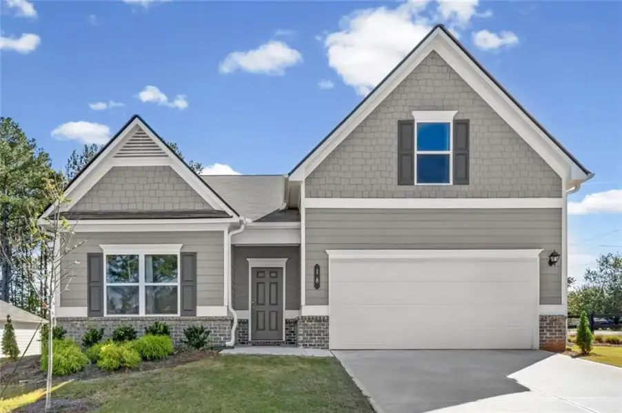 Front exterior of a new home in Allen Manor, Hoschton, GA, highlighting curb appeal (Image 25). Front exterior of a new home in Allen Manor, Hoschton, GA, highlighting curb appeal (Image 25).