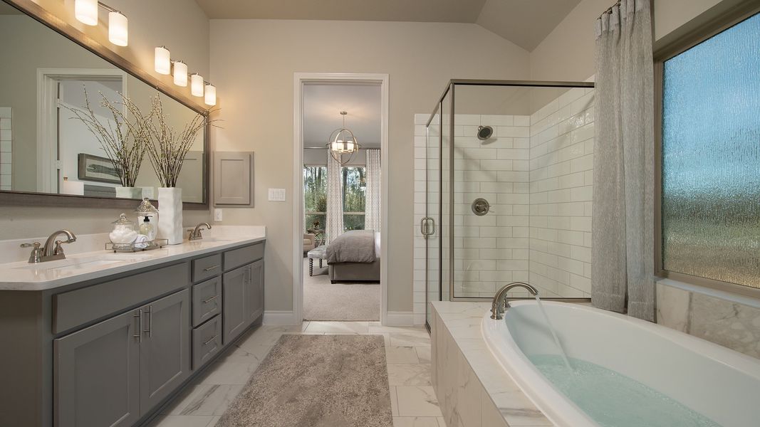 Representative furnished interior of a home built from the 2935M by Perry Homes in Lakes of Cane Island, Katy (Image 16).