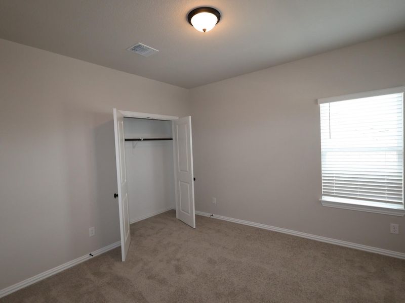 Spacious, unfurnished interior of a new home in Heritage, Dripping Springs (Image 6).