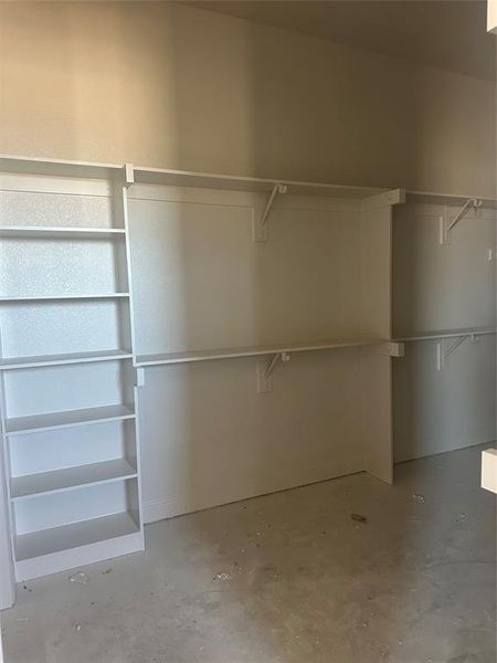 Primary closet conveniently connects to the utility room Primary closet conveniently connects to the utility room