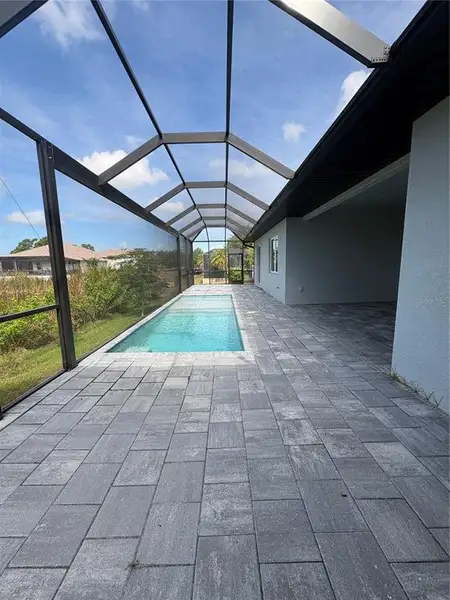 Exterior details and patio area of a home in , Port Charlotte (Image 14).