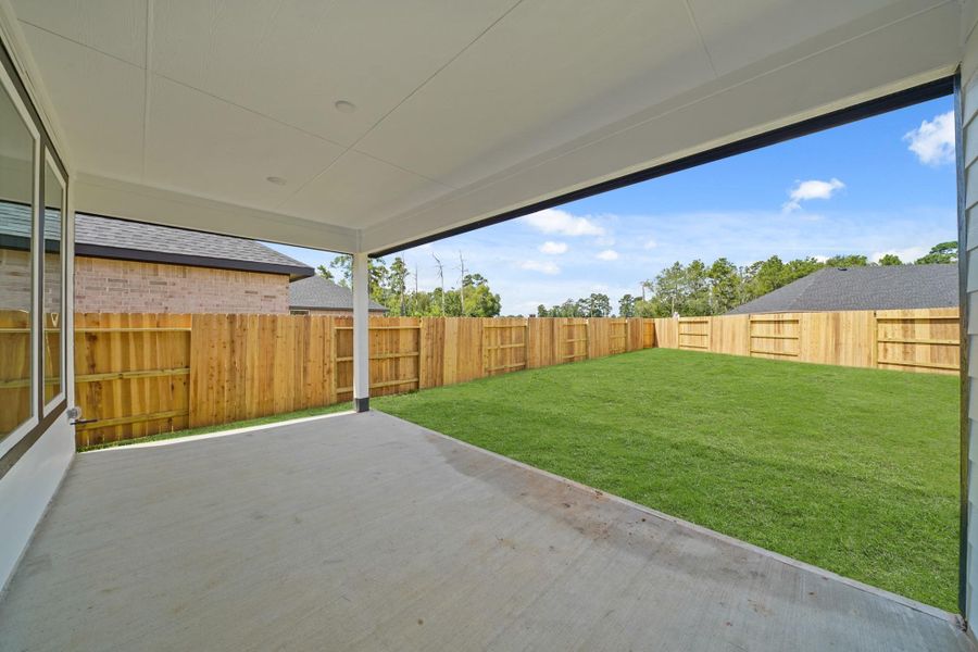 Exterior details and patio area of a home in Hills of Westlake, Conroe (Image 13). Exterior details and patio area of a home in Hills of Westlake, Conroe (Image 13).