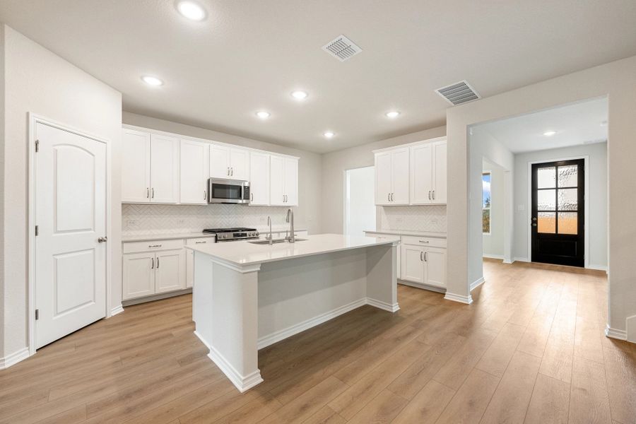 Furnished interior view inside a new home in The Cottages at Lariat, Liberty Hill (Image 8).