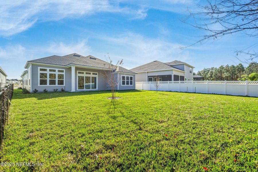 Exterior details and patio area of a home in Silver Landing at SilverLeaf, St. Augustine (Image 35).