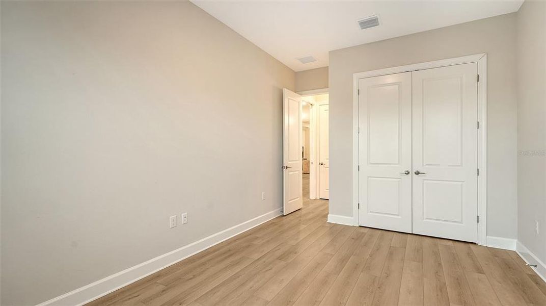 Spacious, unfurnished interior of a new home in Esplanade at Azario Lakewood Ranch, Lakewood Ranch (Image 22).