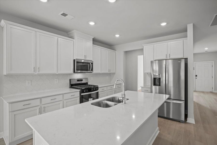 Furnished interior view inside a new home in The Farm at Wells Creek - Signature Collection, Gray Court (Image 7).