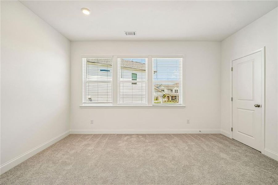 Spacious, unfurnished interior of a new home in Bennett Farm, Loganville (Image 37).