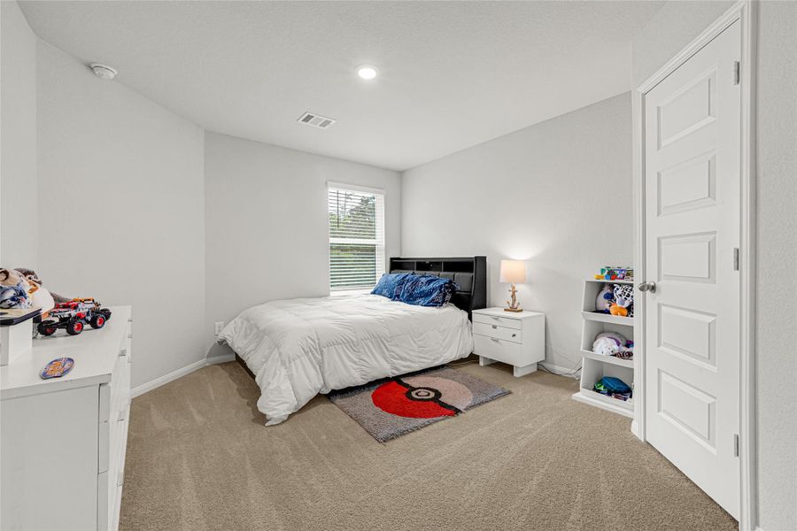 Furnished interior view inside a new home in River's Edge, Conroe (Image 25).