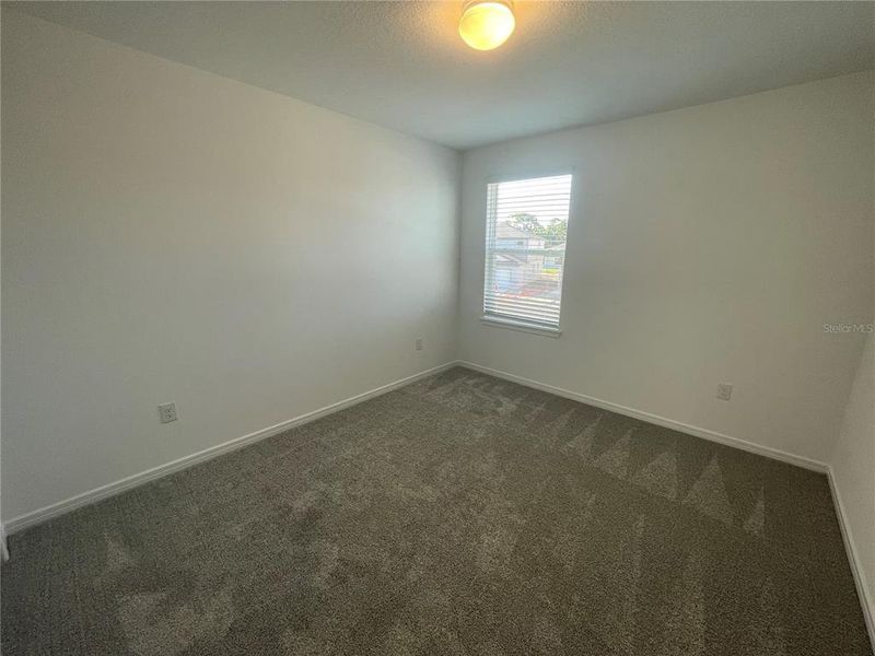 Spacious, unfurnished interior of a new home in Isles at BayView, Parrish (Image 16).