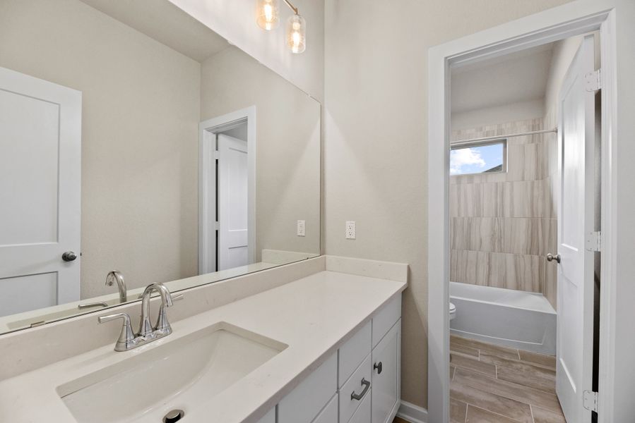 Furnished interior view inside a new home in The Woodlands Hills, Willis (Image 18). Furnished interior view inside a new home in The Woodlands Hills, Willis (Image 18).