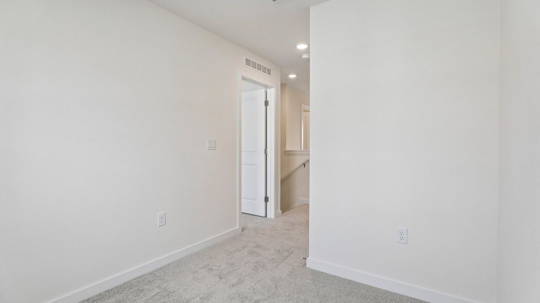 Furnished interior view inside a new home in Cyrene at Harmony, St. Cloud (Image 26).