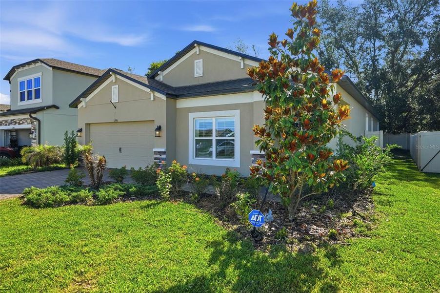 Front exterior of a new home in Hilltop Point, Dade City, FL, highlighting curb appeal (Image 28). Front exterior of a new home in Hilltop Point, Dade City, FL, highlighting curb appeal (Image 28).