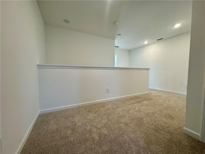 Spacious, unfurnished interior of a new home in Eastlyn Crossing, Flowery Branch (Image 25). Spacious, unfurnished interior of a new home in Eastlyn Crossing, Flowery Branch (Image 25).