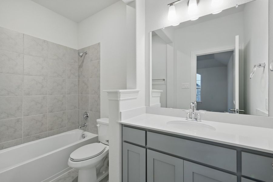 Representative furnished interior of a home built from the Classic Series - Dartmouth by DRB Homes in Oaks at San Gabriel, Georgetown (Image 27).