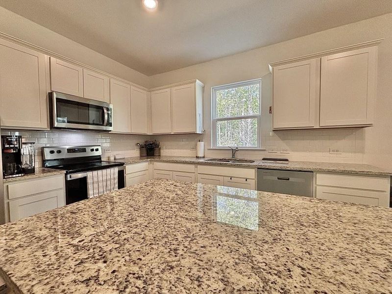 Furnished interior view inside a new home in , Gainesville (Image 41).
