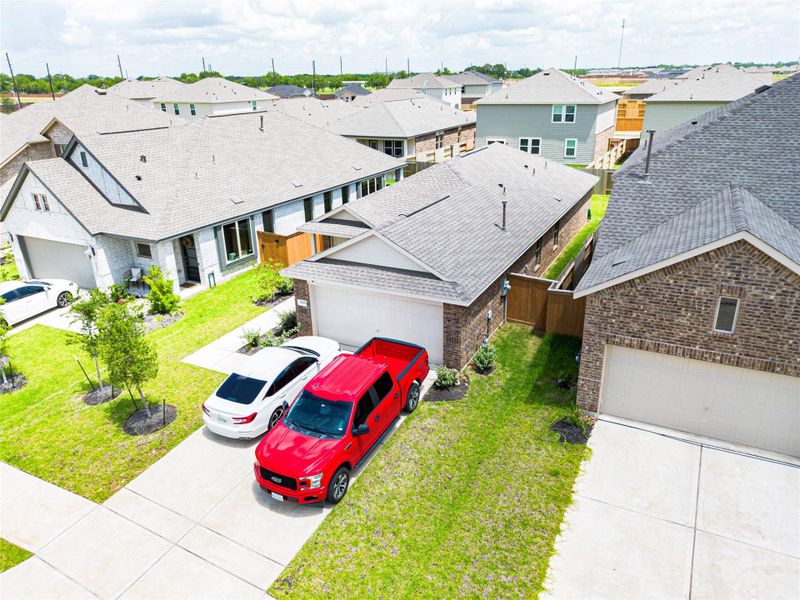 Exterior details and patio area of a home in Sunterra, Katy (Image 3).