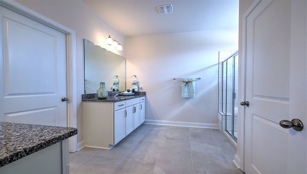 Furnished interior in a model home at Reserve at Tap Root Farms in Fletcher (Image 22).