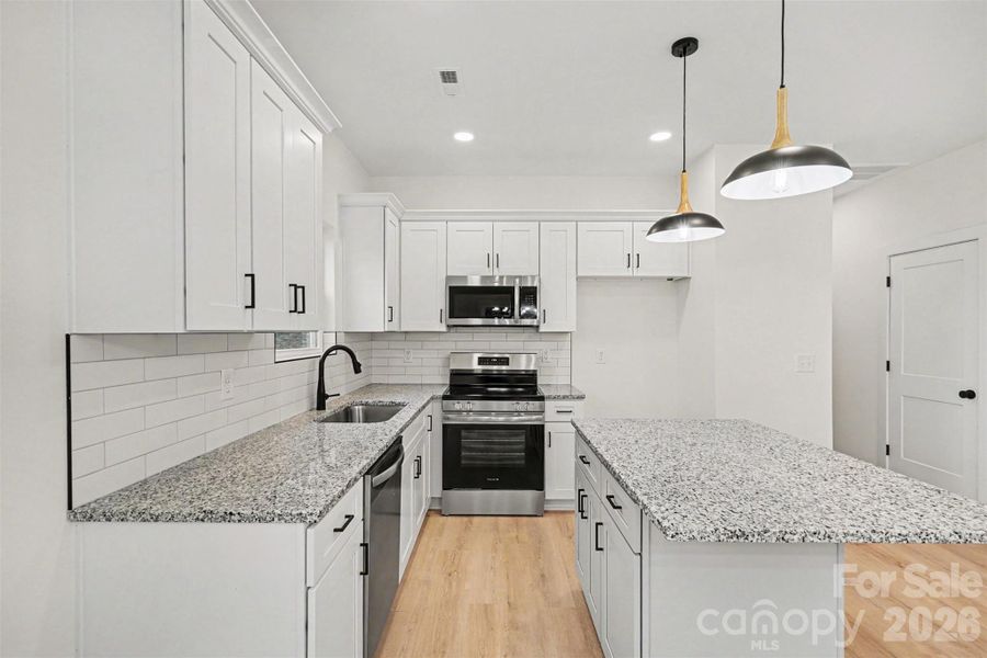 Furnished interior view inside a new home in , Charlotte (Image 11).