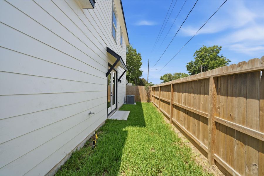 Exterior details and patio area of a home in , Houston (Image 3). Exterior details and patio area of a home in , Houston (Image 3).