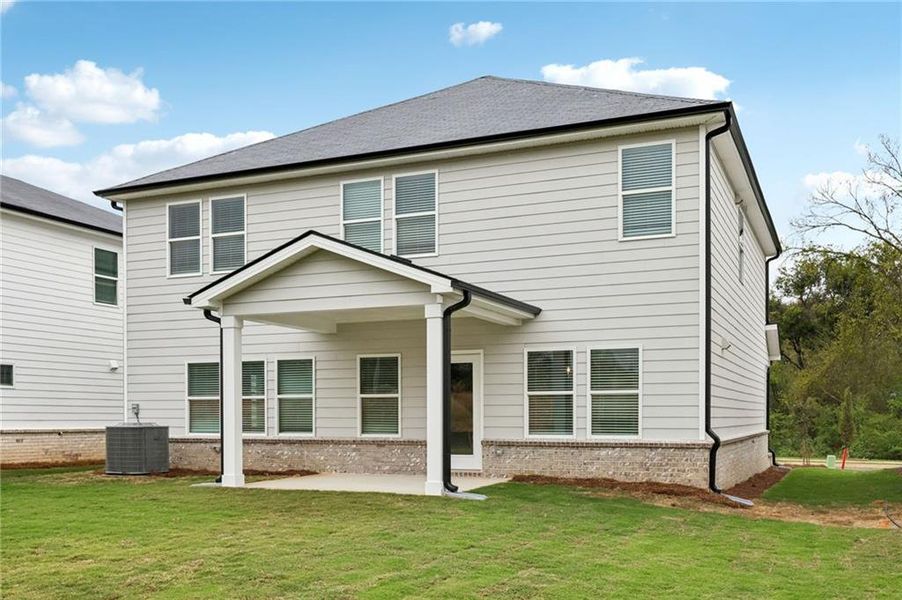 Exterior details and patio area of a home in Westmont Preserve, Powder Springs (Image 3).