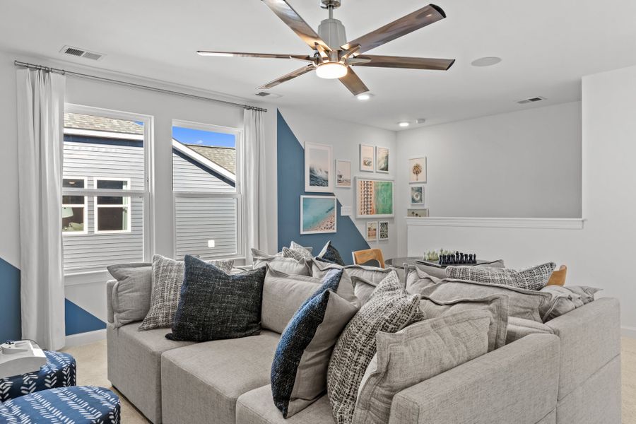 Representative furnished interior of a home built from the The Longboard by Chesapeake Homes in Coastal Club of the Carolinas, Calabash (Image 27).