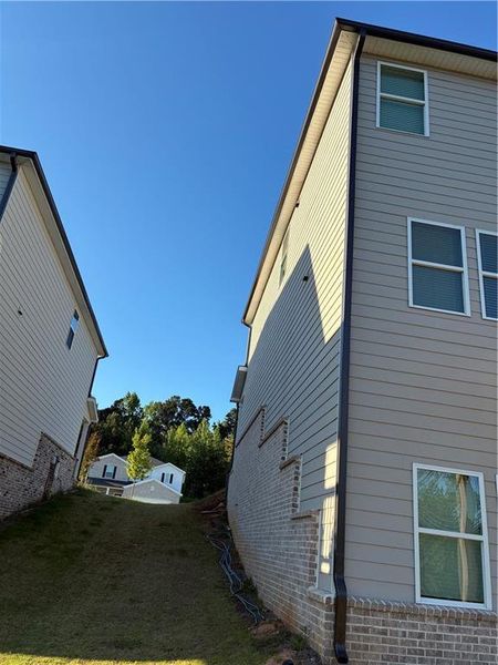 Exterior details and patio area of a home in Hamilton Crossing, Buford (Image 15).