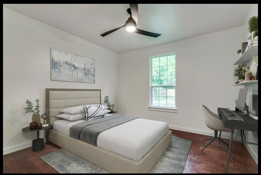 Bedroom featuring dark hardwood / wood-style floors and ceiling fan